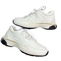 C white trainers