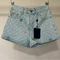 MONOGRAM DENIM SHORTS