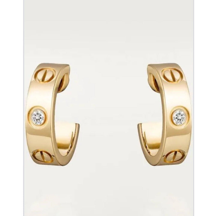 Cartier small earrings gold diamonds