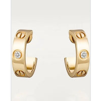 Cartier small earrings gold diamonds
