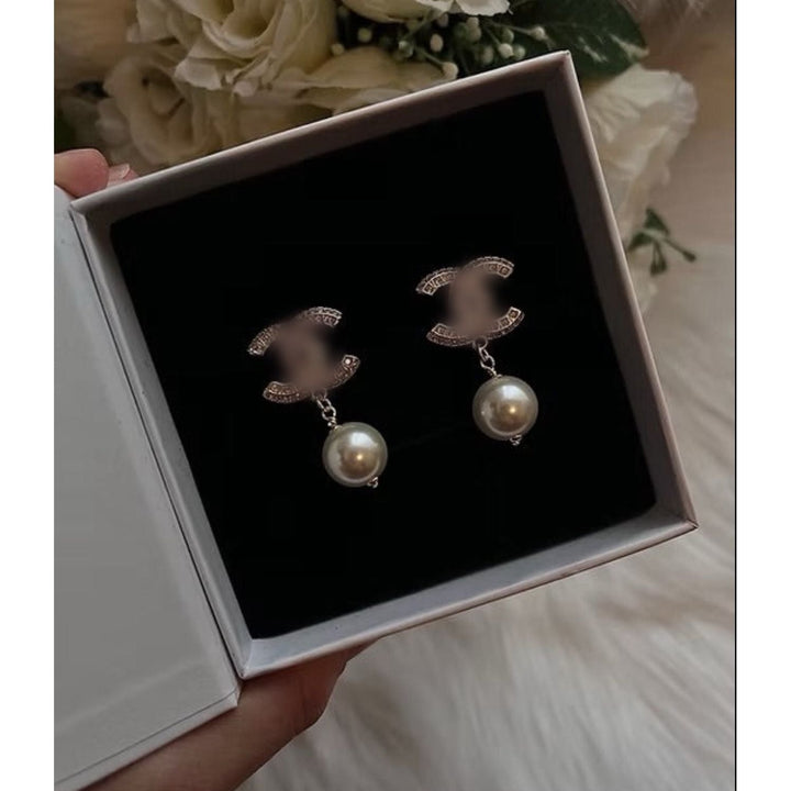 CC pearl earrings
