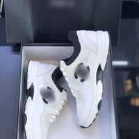 CC white & black trainers